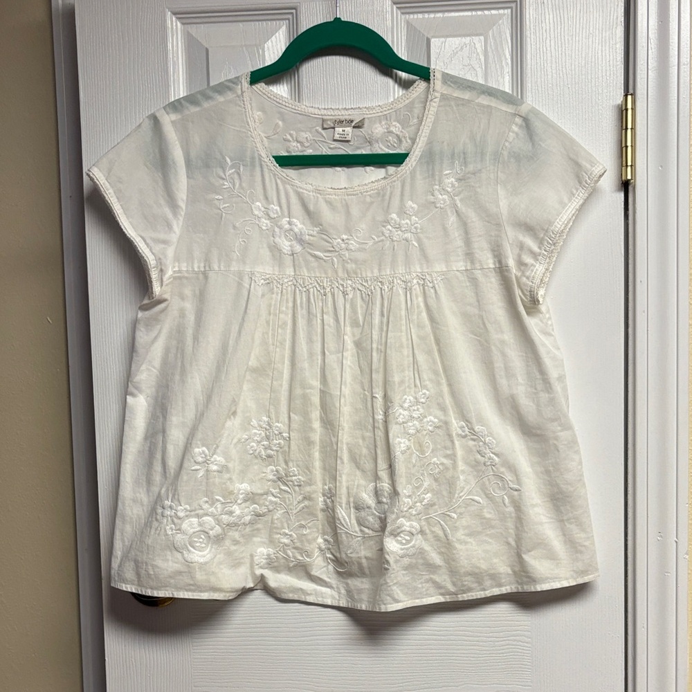 Cute cut white cotton embroidered Tyler Boe top